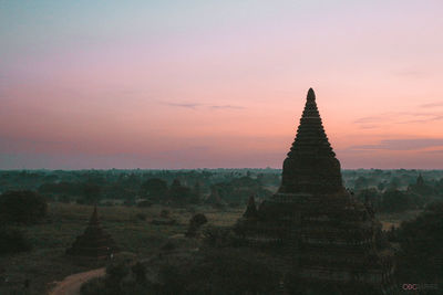 Stupas of a building at sunset