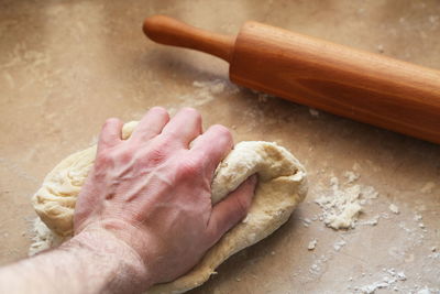 Close-up of hand kneading