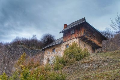 Low angle view of old building against sky