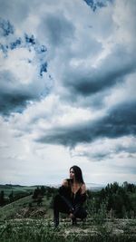 Full length of woman on field against sky