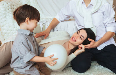 High angle view of mother and daughter at home