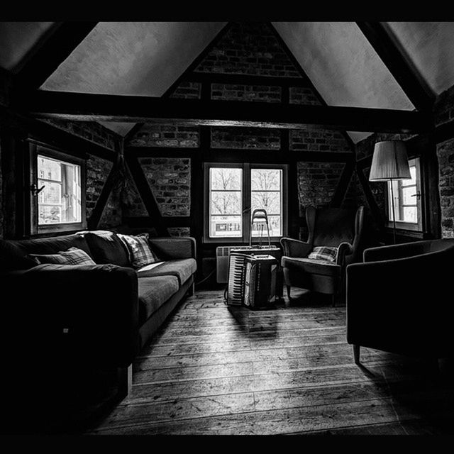 indoors, empty, absence, chair, window, table, architecture, built structure, flooring, wood - material, door, house, no people, home interior, interior, day, seat, hardwood floor, open, reflection