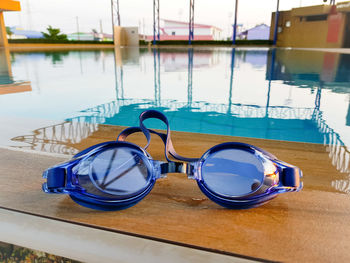 Close-up of swimming pool against lake