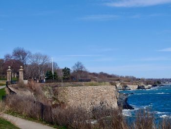 Scenic view of landscape against blue sky