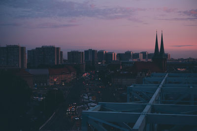 High angle view of city buildings during sunset