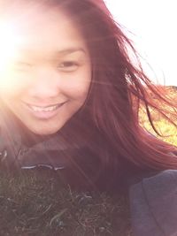 Close-up of smiling young woman