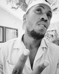 Portrait of young man looking away