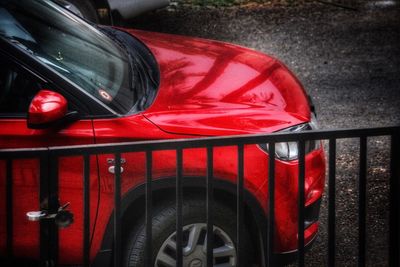 High angle view of red car on street