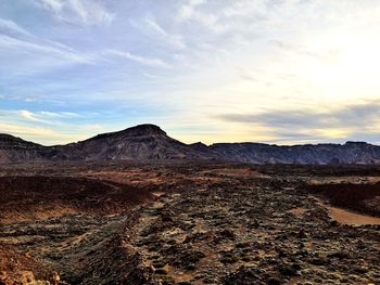 Scenic view of desert against sky