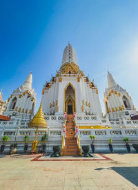 Low angle view of temple against clear blue sky