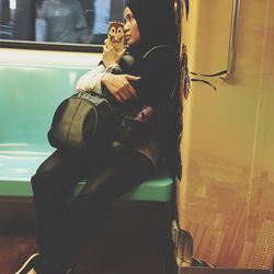 Woman sitting on bench