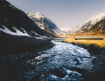 Scenic view of snowcapped mountains against sky