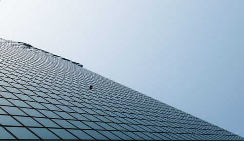 Low angle view of modern building against clear sky
