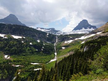View of logan pass from going to the sun road in glacier national park on a stormy summer afternoon