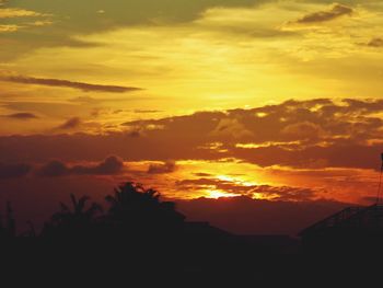 Scenic view of dramatic sky during sunset