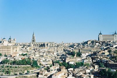 View of cityscape against clear sky