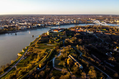 High angle view of river amidst buildings in city