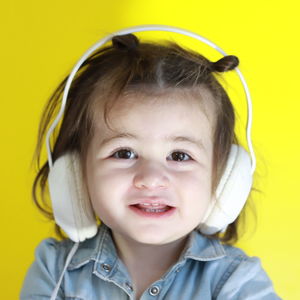 A happy girl listens to music in israel