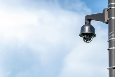 Outdoor cctv security camera and beautiful sky, image with copy space