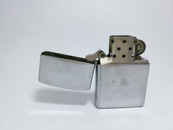 High angle view of telephone booth on table against white background