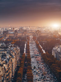 High angle view of city buildings during sunset