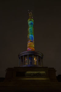 Low angle view of statue at night