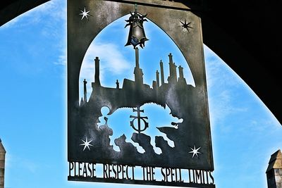 Low angle view of built structure against blue sky