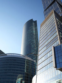 Low angle view of modern building against clear sky