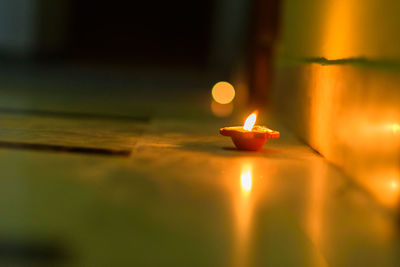 Close-up of burning candle