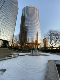 Modern building against sky during winter