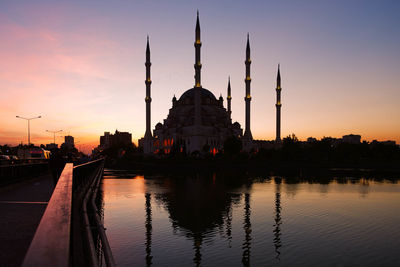 City at sunset mosque reflection 