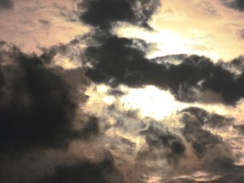 Low angle view of cloudy sky during sunset