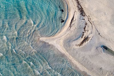 High angle view of surf on beach