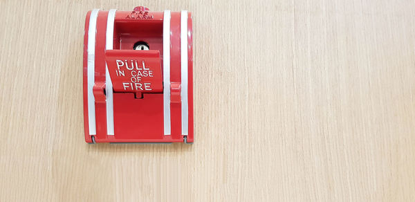 Close-up of red box on wall