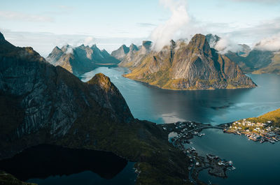 Scenic view of a fjord, mountains and a village from a viewpoint. ideal for landscape projects.