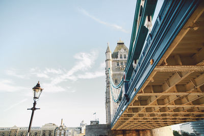 Low angle view of tower bridge against sky