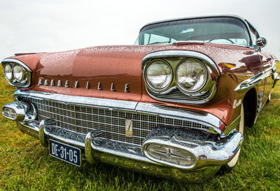 Old vintage car on field