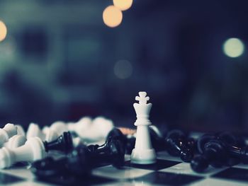 Close-up of chess pieces on board