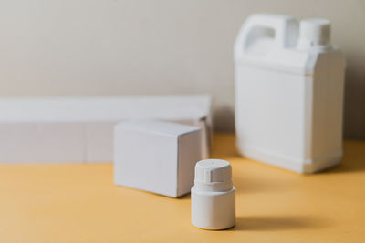 Close-up of beauty products on table