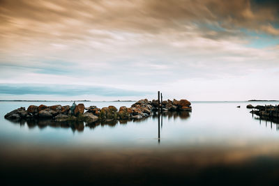 Scenic view of sea against sky during sunset