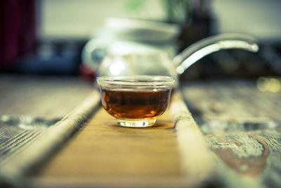 Close-up of beer glass on table