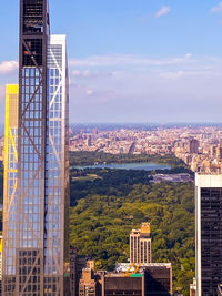 High angle view of buildings in city against sky