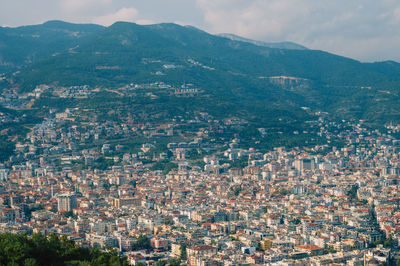 Aerial view of townscape against sky