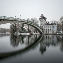 Bridge over river against sky