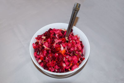 High angle view of strawberries in bowl on table