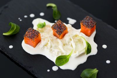 Close-up of sushi served on table