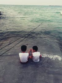 High angle view of people at sea shore