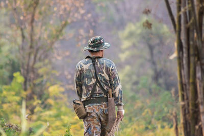 Full length rear view of man