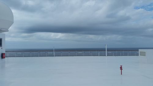 Bridge over sea against sky