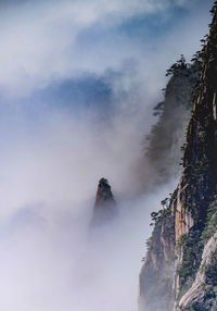 View of mountain against cloudy sky